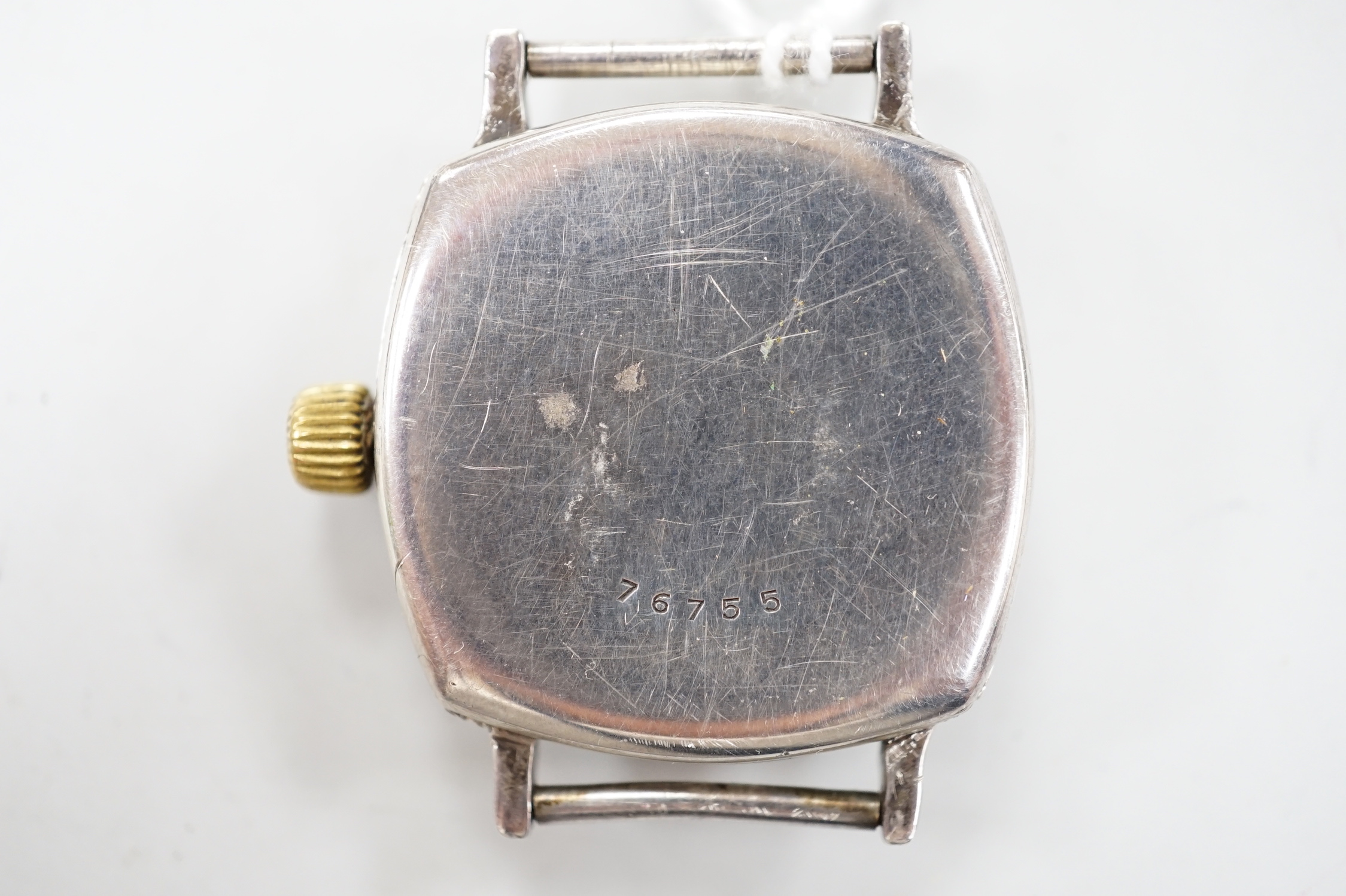 A 1930's? silver manual wind wrist watch, the dial inscribed 'Submarine', with subsidiary seconds, case diameter 30mm, no strap.